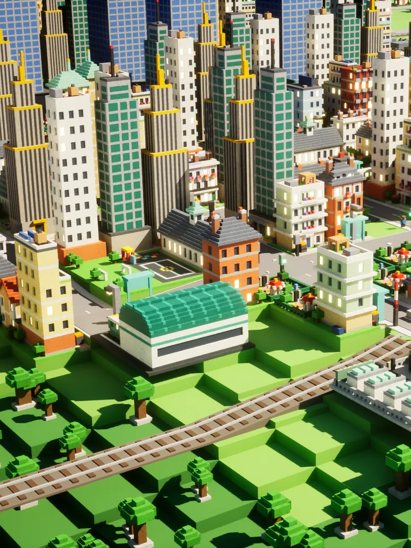 A railway station with a green glass roof beside the tracks, at the foot of a town of towers and terraces.